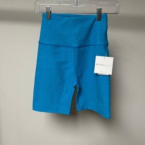 Beyond yoga high waisted biker short blue glow heather